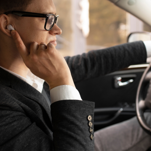 can you wear one earbud while driving