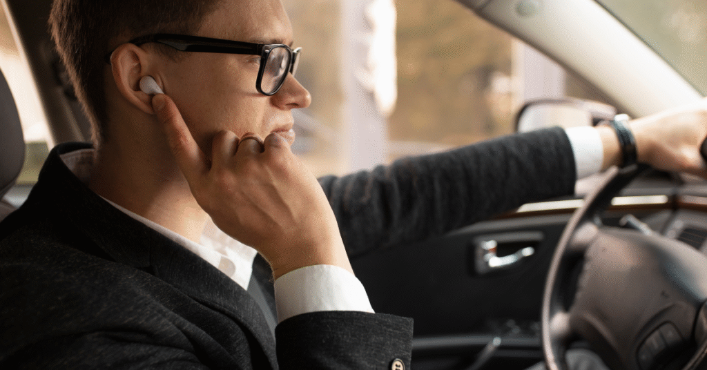 can you wear one earbud while driving